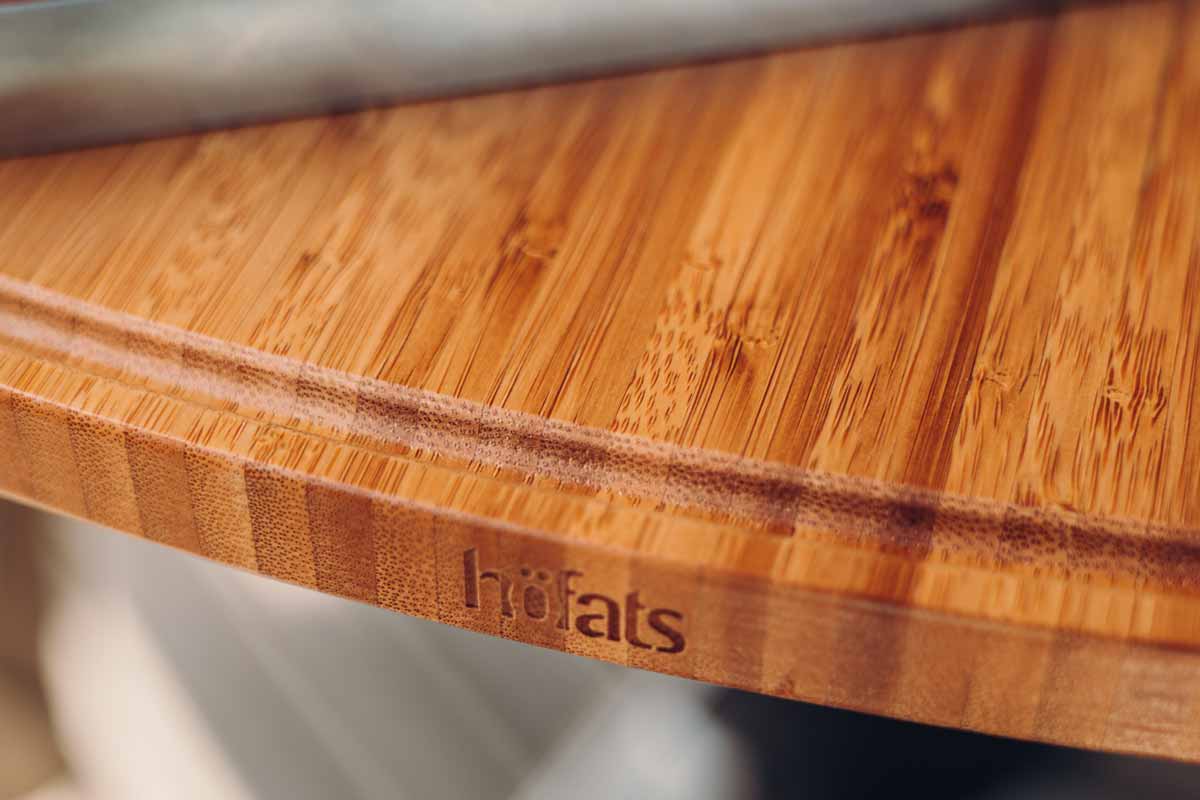 CONE Board Illustrated is a close up of a cutting board on a table, with the CONE Board.