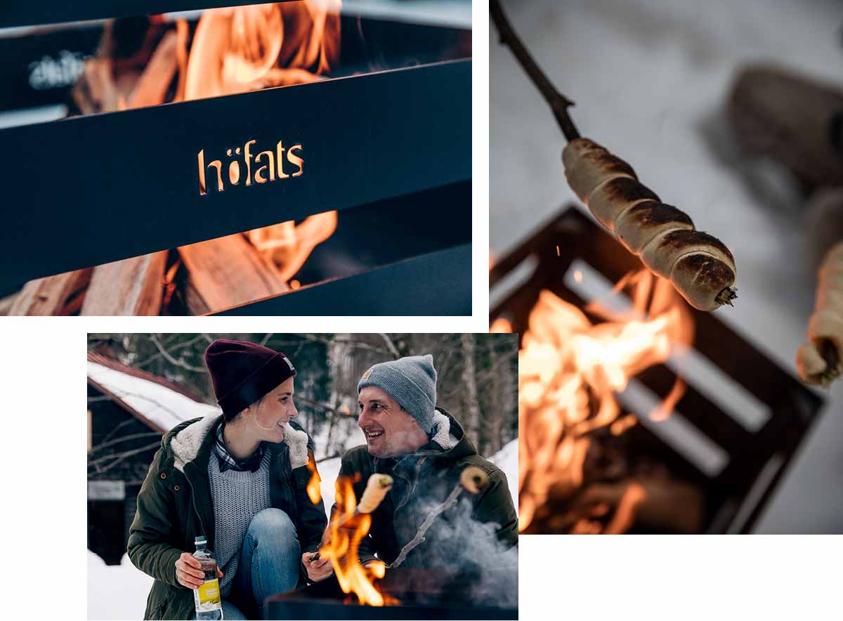 La photo présente un couple assis près d'un feu et buvant du vin, avec le SPIN 120 Feu de Table argenté.