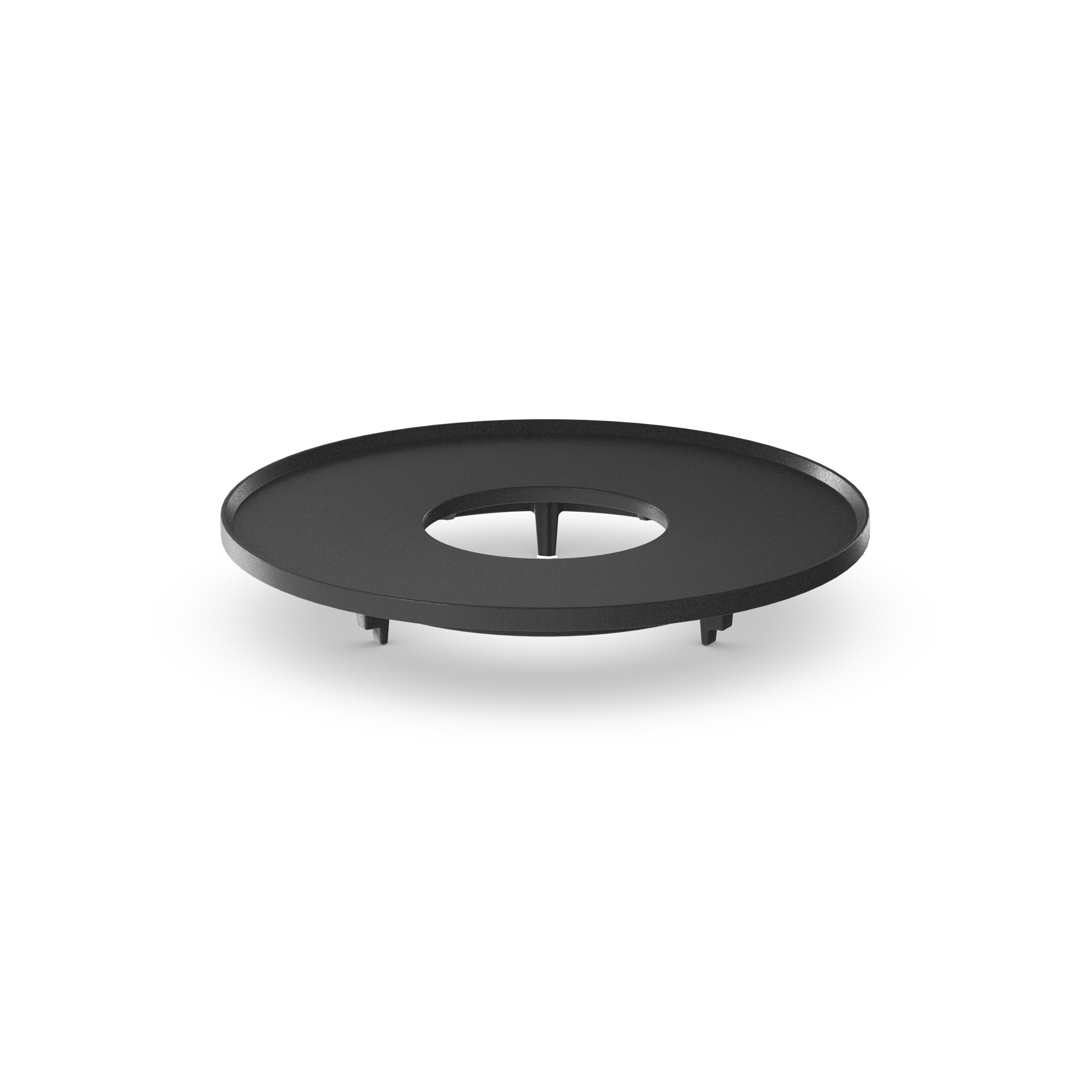 MOON 45 Plancha BBQ Set high A black round metal plate on a white background, with the 00963 Moon 45 Plancha BBQ Set high adding a functional and elegant touch to the scene.