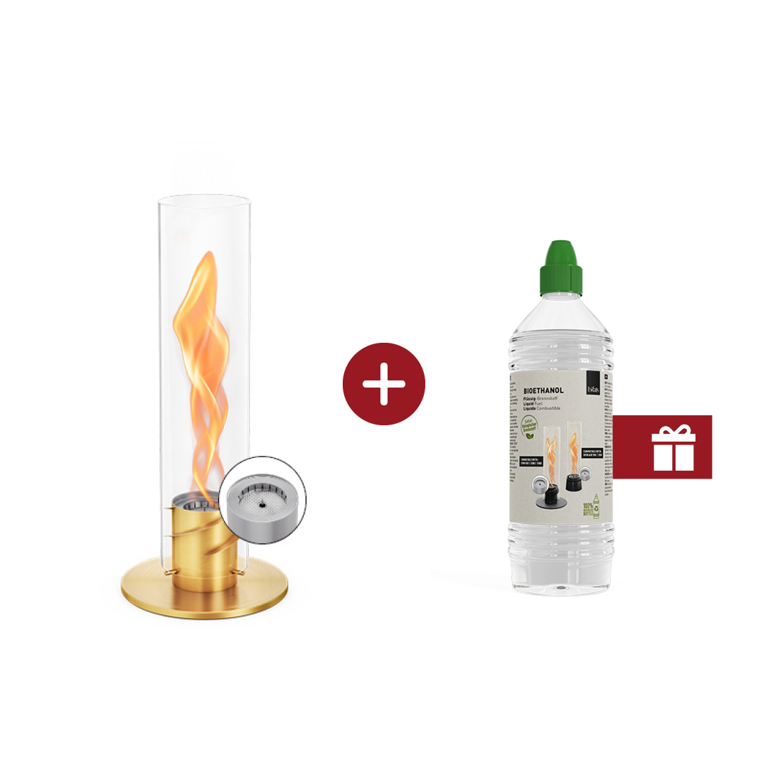 SPIN 900 Tabletop Fireplace gold An inviting scene with a SPIN and a bottle of ethanol with a gift lable on it