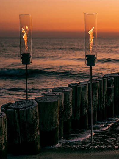 Two SPIN Torches at a beach scenary