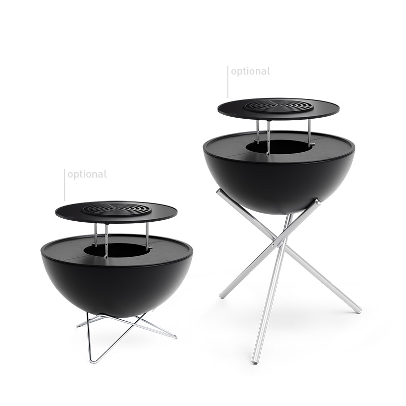 A depiction of two black barbecues with a grill on top, featuring the 00611 Bowl 57 Sear Grate as a central and purposeful element.