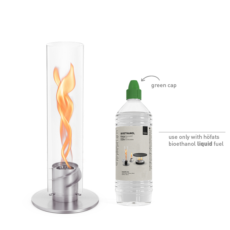 SPIN classic 1200 Tabletop Fireplace silver A white background with the 00695 Spin 1200 Tablefire silver and a bottle of bioethanol liquid