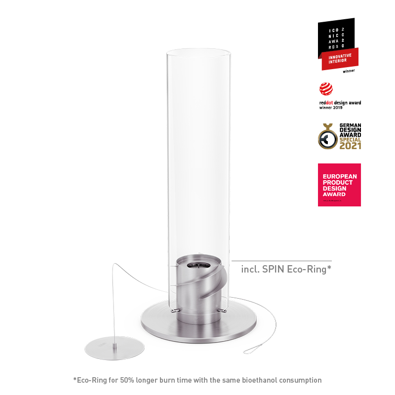 SPIN classic 1200 Tabletop Fireplace silver The photo presents a white metal cylinder with a silver base, with the SPIN 1200 Tabletop Fireplace silver.