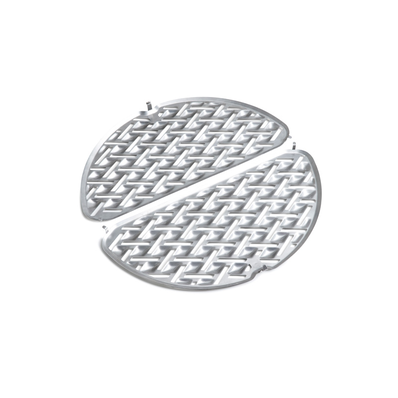 CONE Cast Iron Grid Scene showing a black round metal grid, where the CONE Cast Iron Grid stands out for its practical elegance.