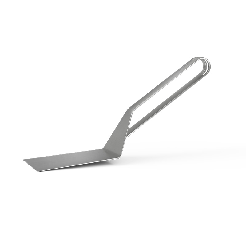 Spatula A depiction of a metal Spatula with a handle on a white background, featuring the 00473 Spatul as a central and purposeful element.