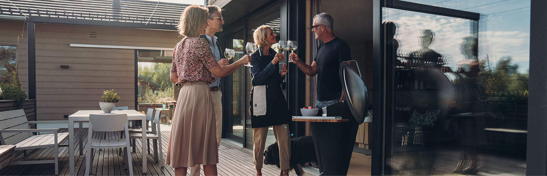 Illustrated is a man and woman standing outside a house