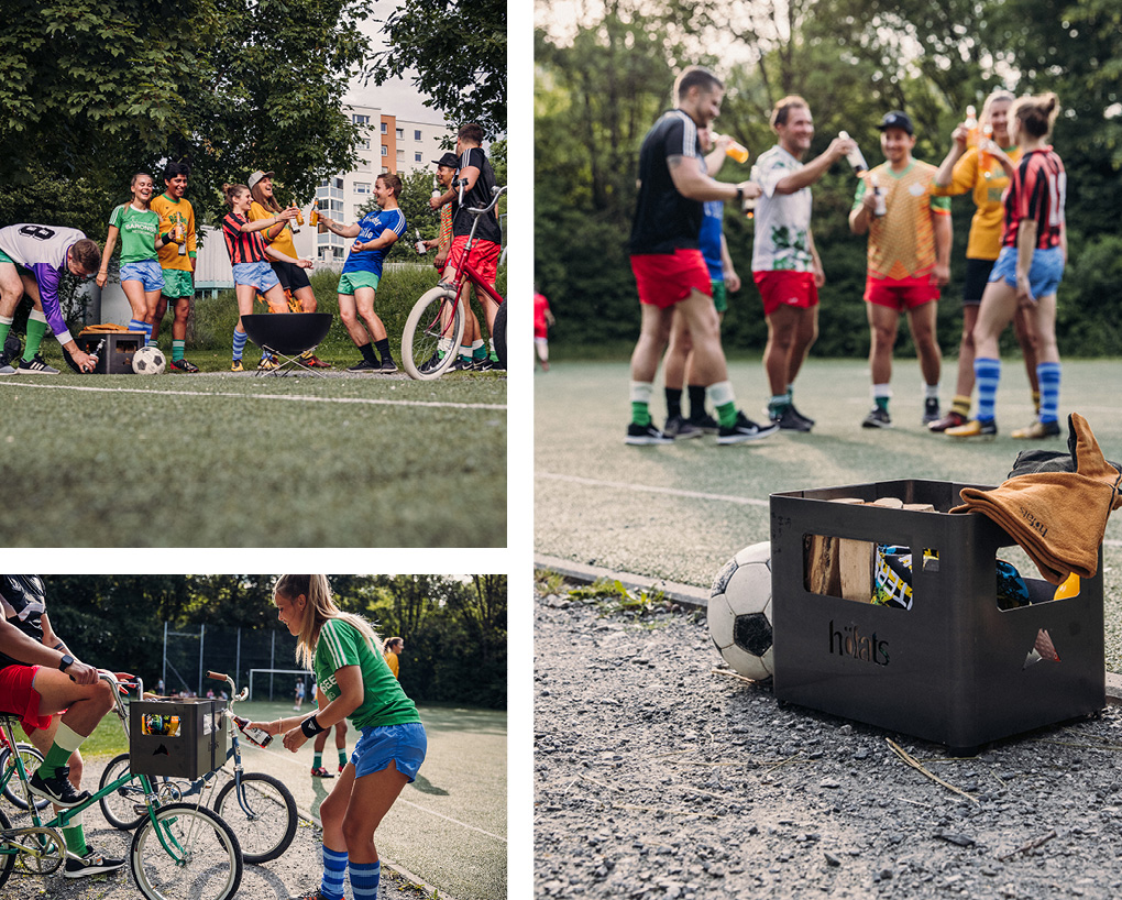 The photo presents a group of people standing around a box
