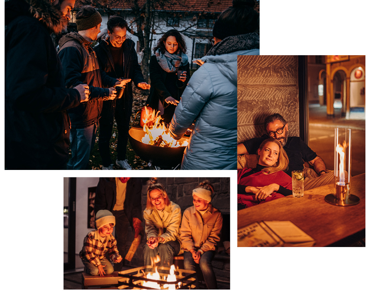 The photo presents a group of people gathered around a fire