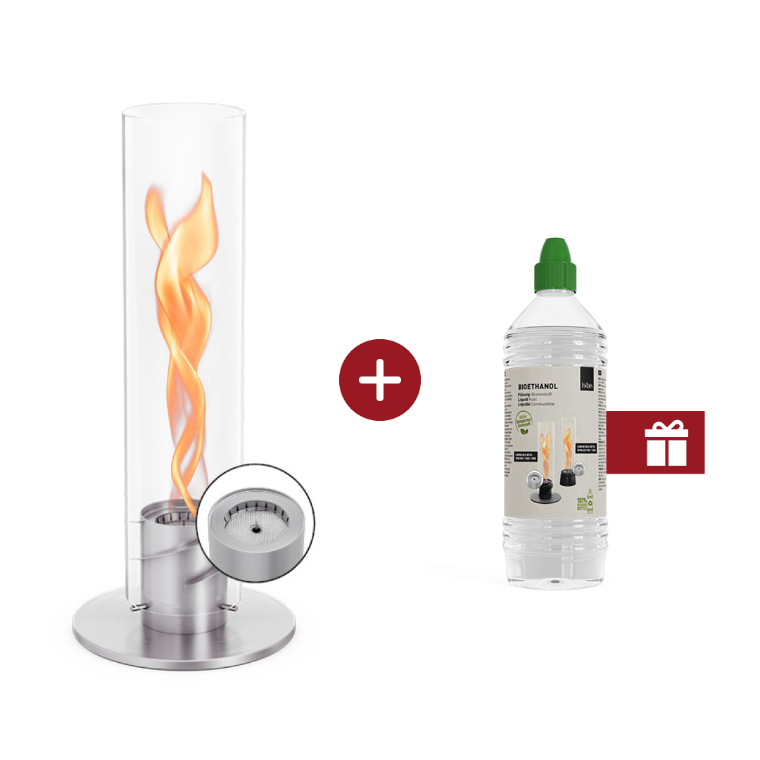SPIN 1200 Tabletop Fireplace silver An inviting scene with a SPIN and a bottle of ethanol with a gift lable on it