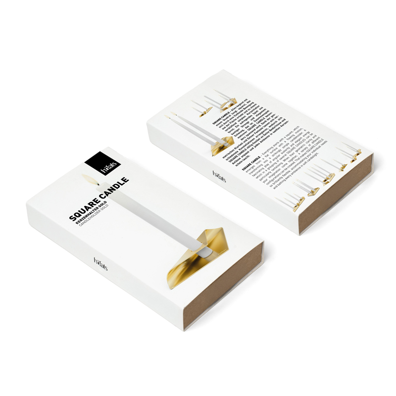 SQUARE CANDLE Candleholder gold An inviting scene highlights the Square Candle Candleholder Gold Packaging, blending effortlessly into its surroundings.