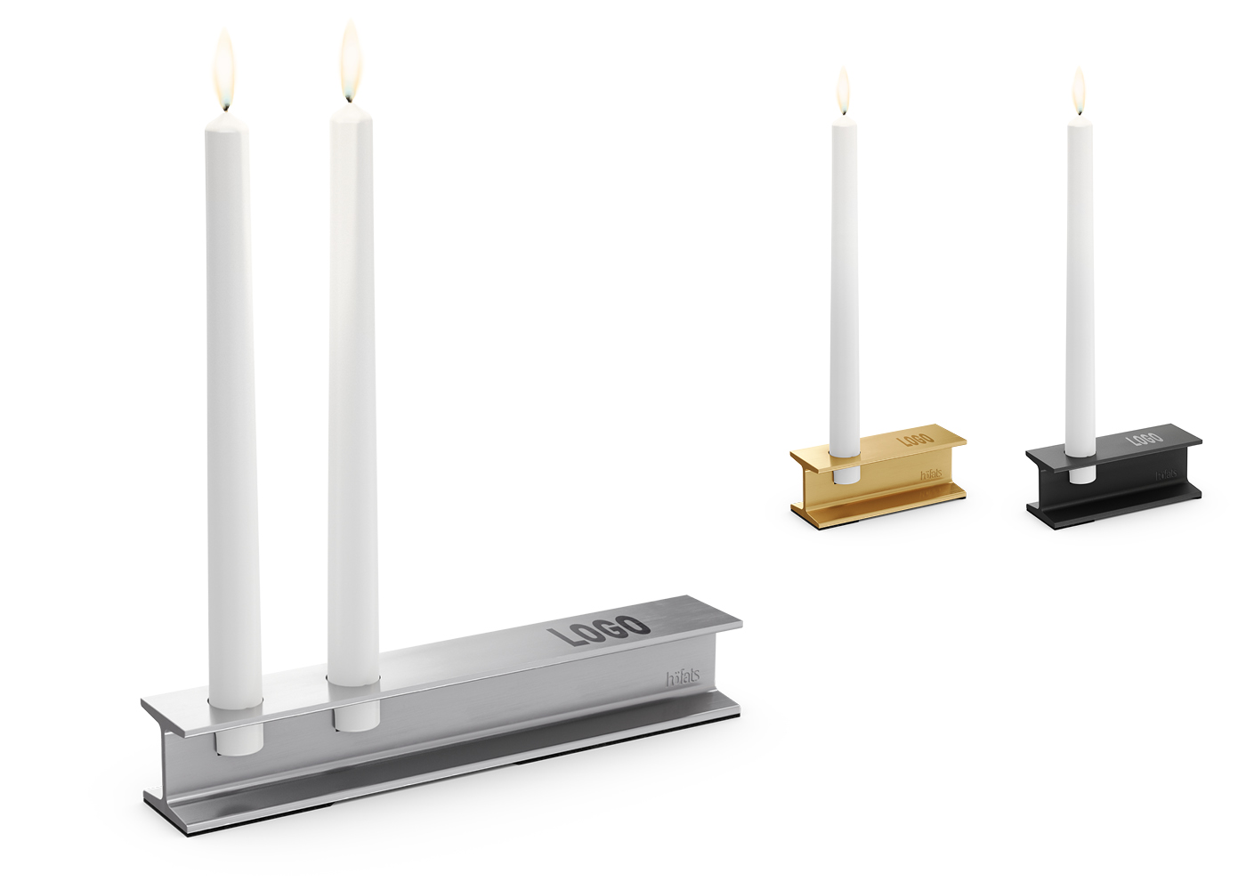 a white candle with a black stand