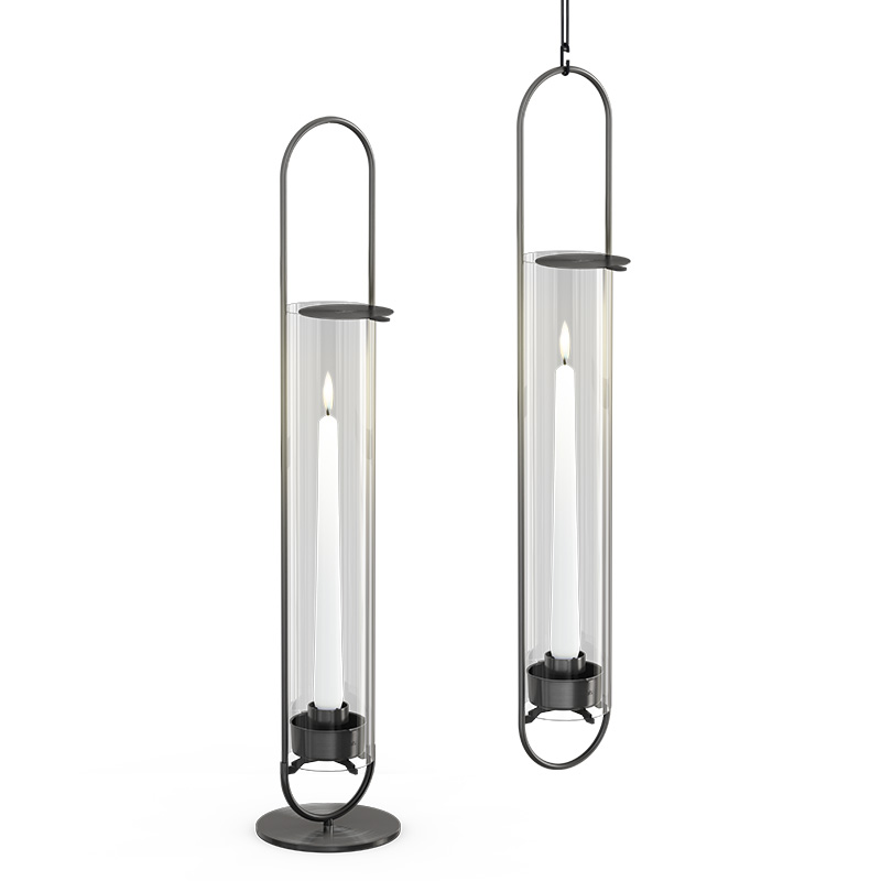 Illustrated is a pair of two black and clear glass lamps, with the OVAL CANDLE 55 Base black brushed.
