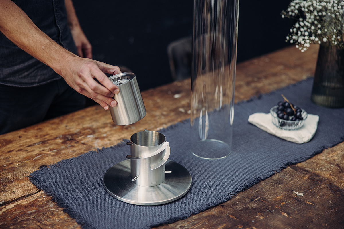 SPIN 1200 Bio-Burner with Eco-Ring and Extinguishing Lid Experience a person pouring ethanol into the 00696 Spin 1200 Bio Burner