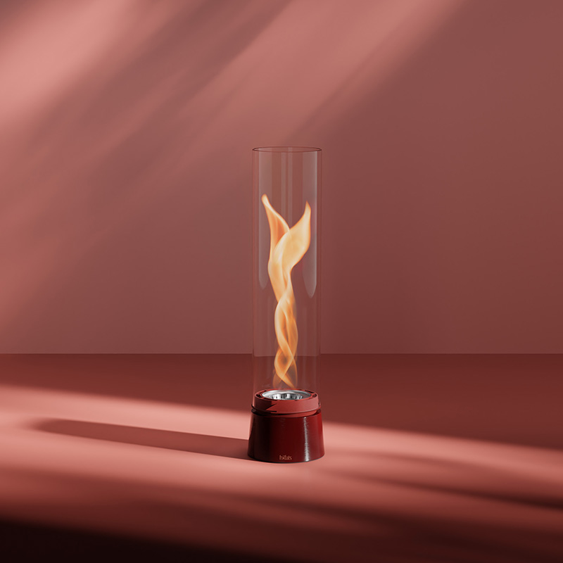 Une rotation avec une flamme à l'intérieur du 00813 SPIN air 900 Feu de Table Émail rouge complète le moment avec son design réfléchi.