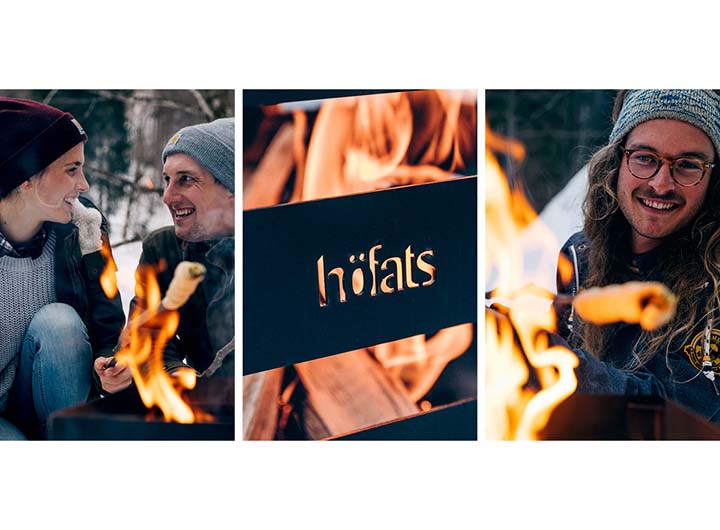 The photo presents a couple sitting around a fire and laughing, with the Atmospheric image Christmas for Console.