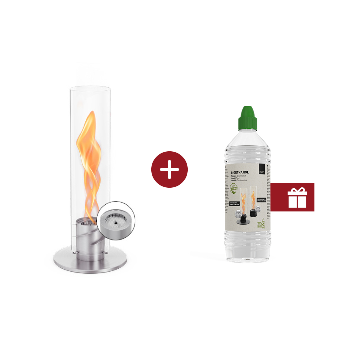 SPIN 900 Tabletop Fireplace silver An inviting scene with a SPIN and a bottle of ethanol with a gift lable on it