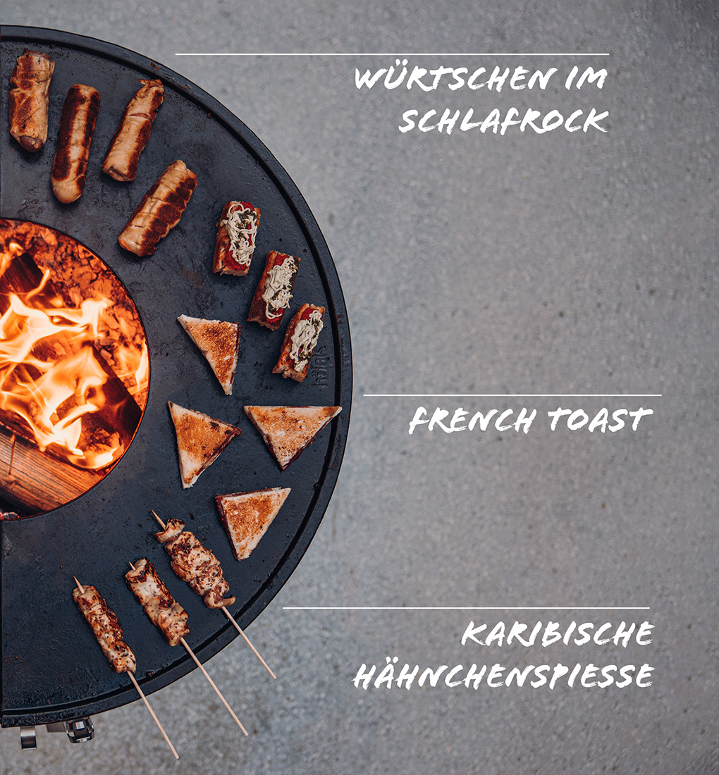 Ein Feuerstelle mit einer Vielzahl verschiedener Arten von Lebensmitteln