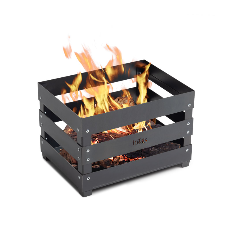 CRATE Fire Basket A fire pit with flames on it, enriched by the presence of the Crate Firebasket Feuer, which merges design with utility.