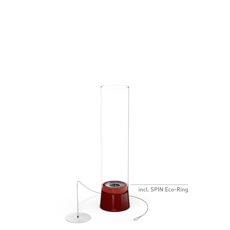 SPIN air 900 Feu de Table émail rouge Une scène accueillante avec une base rouge avec un cylindre en verre, mise en valeur par la présence du 00813 SPIN air 900 Feu de Table Émail Rouge.